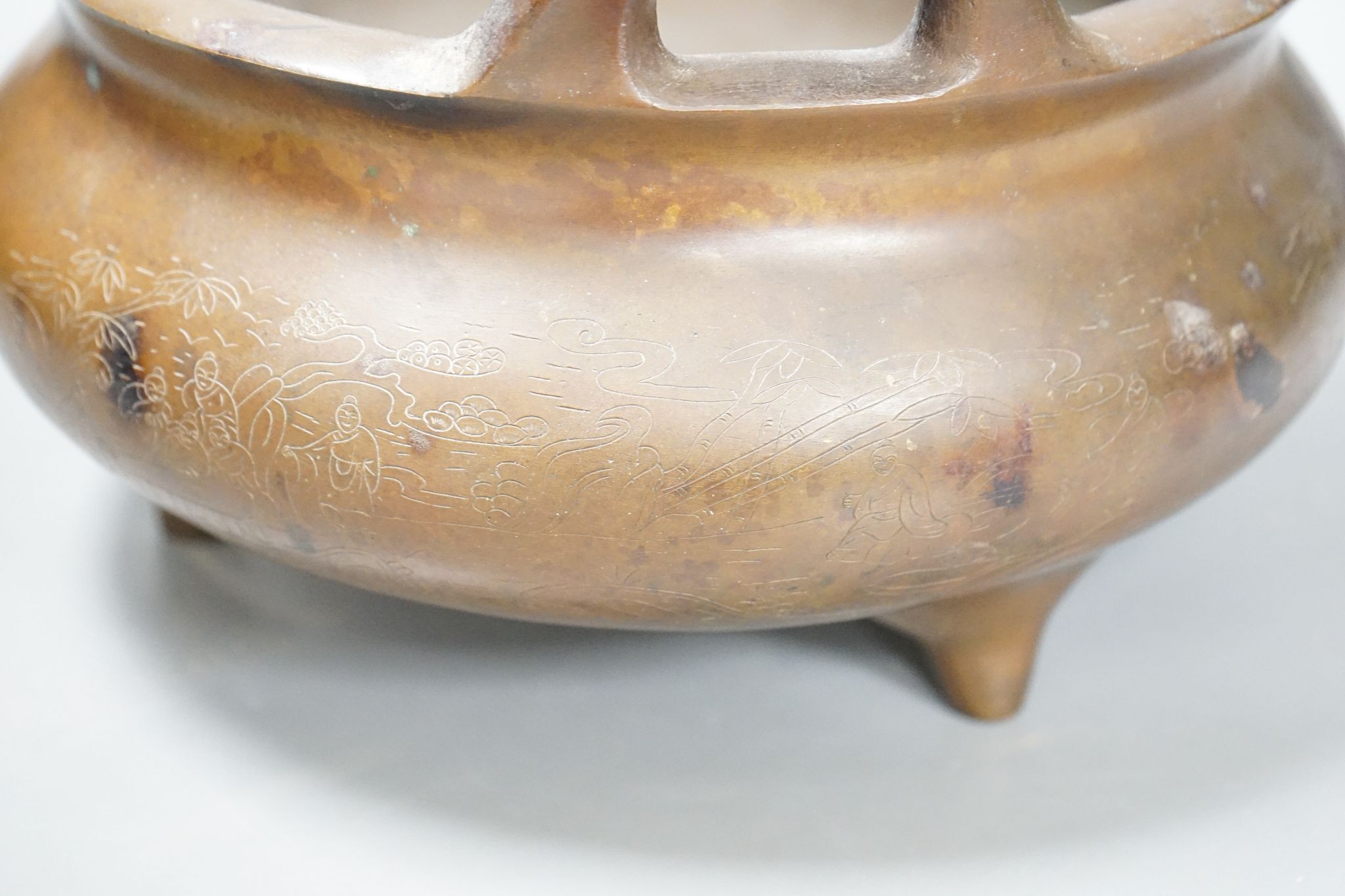 A large Chinese bronze tripod censer, Xuande mark, 24cm handle to handle